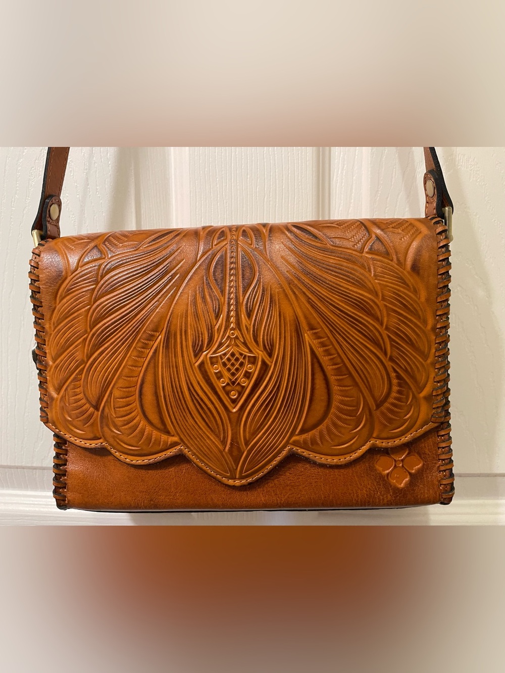 Hand-Tooled Brown Leather Clutch